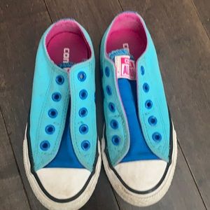 Turquoise slip on Converse runners
